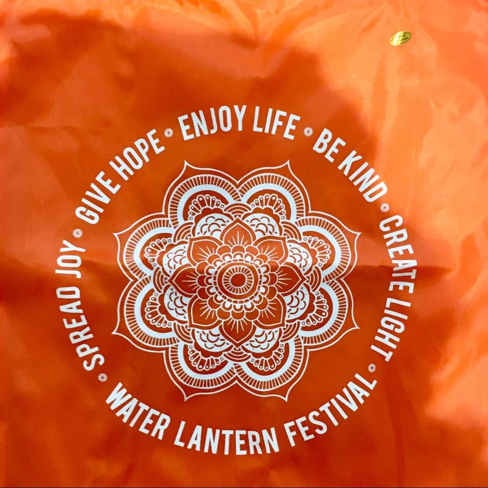 NWOT Neon Orange with White Lettering Water Lantern Festival Drawstring Backpack - Picture 2 of 4